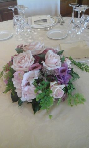 Centerpieces with hydrangeas and roses
